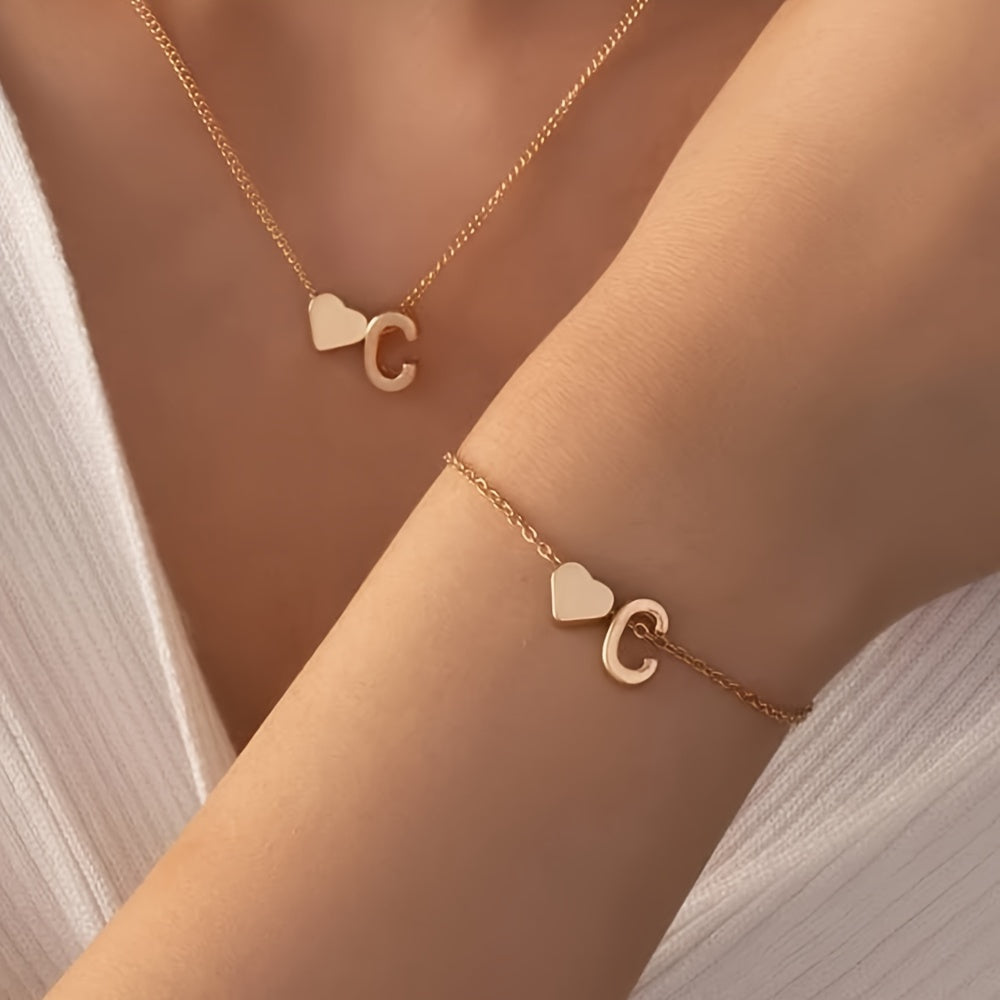 A Stylish And Minimalist Two-Piece Set Featuring a Metal Heart And English Letter Necklace And Bracelet, Perfect for Everyday Commuting Wear.