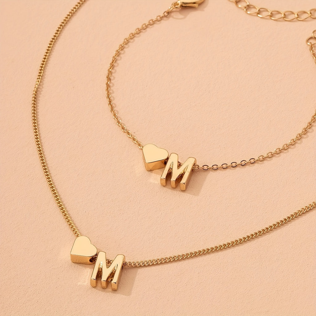 A Stylish And Minimalist Two-Piece Set Featuring a Metal Heart And English Letter Necklace And Bracelet, Perfect for Everyday Commuting Wear.
