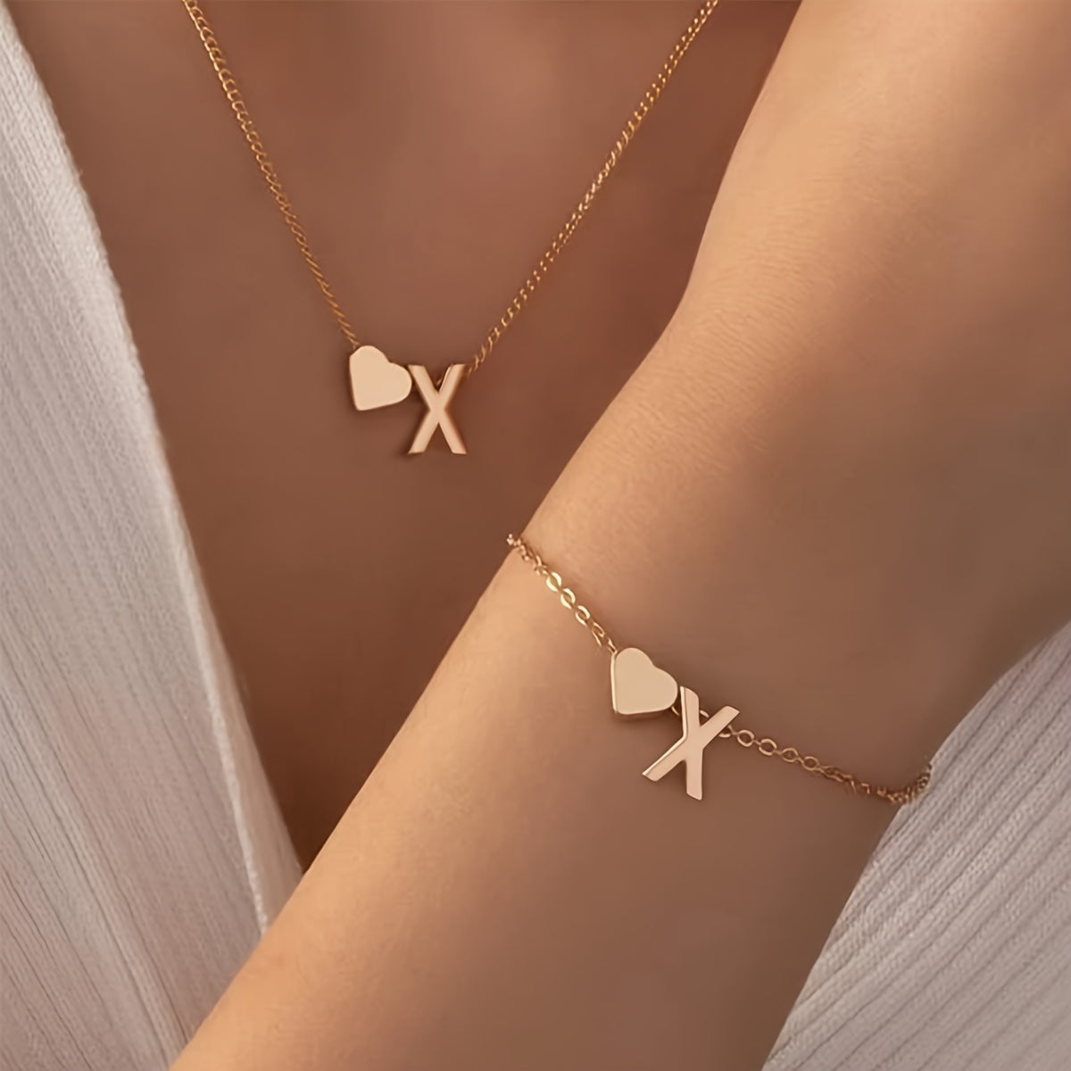 A Stylish And Minimalist Two-Piece Set Featuring a Metal Heart And English Letter Necklace And Bracelet, Perfect for Everyday Commuting Wear.