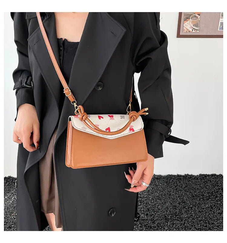 Fashion handbag women's personality early spring new simple fashion trendy printing casual messenger niche small square bag