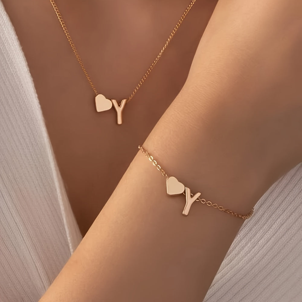 A Stylish And Minimalist Two-Piece Set Featuring a Metal Heart And English Letter Necklace And Bracelet, Perfect for Everyday Commuting Wear.